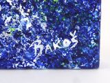 a picture of a blue and green painting on the wall
