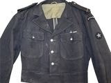 an old military jacket with a star on the chest