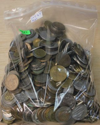 a bag full of coins sitting on a table