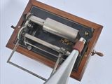 a machine that is attached to the side of a pole