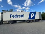 a semi truck that is parked in a parking lot