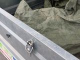 a truck with a bed in the back of it