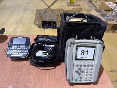 a cell phone, a bag, and a cell phone sitting on a table