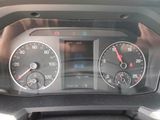 a close up of a car dashboard with various gauges and numbers