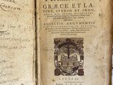 an old book with writing on it on a table