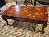 a coffee table with a floral design on it