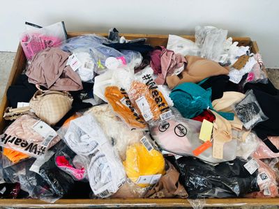 a box full of clothes and other items that are in it
