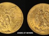 a close up of two gold coins on a black background