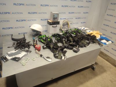 a table with a lot of assorted items on top of it