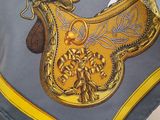 a blue and yellow purse on a mannequin mannequin