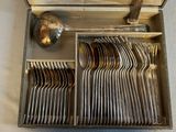 silverware in a box with spoons and spoons in it