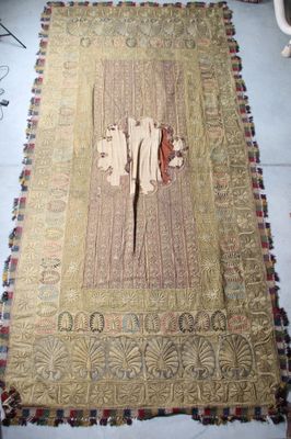 a rug that has a picture of a man and a woman on it