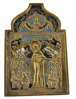 a gold and blue plaque with an image of a woman holding a child