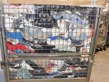 a metal cart with a lot of trash in it