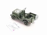 a toy army jeep with a star on the back