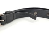 black leather belt with a metal buckle on a white background
