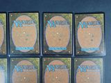 six decks of magic the gathering card game are shown