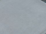 a close up of a piece of cloth on the ground