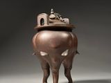 vase à encens chinois en bronze orné d'un éléphant et d'un oiseau sur le dessus