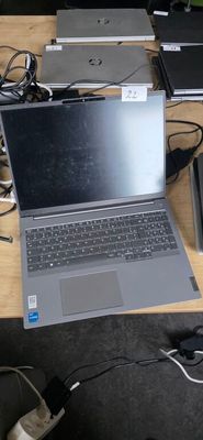 many laptops that are sitting on a table