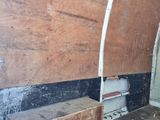 an image of a room that has a lot of wood on the walls