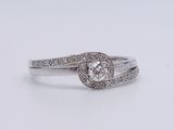 a picture of a diamond ring on a white background