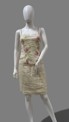 an image of a mannequin wearing a dress with flowers on it