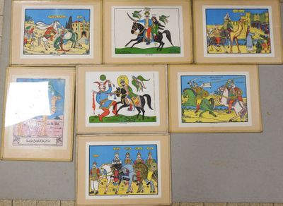 several framed pictures of cartoon characters on a wall in a room