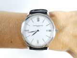 a close up of a person ' s wrist with a watch on it