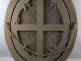 a round metal object with a hole in the middle of it