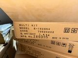 several boxes are stacked on top of each other on a table