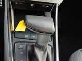 a close up of a car ' s gear knob and gear shift