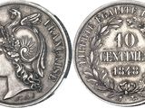 a close up of a coin with a woman ' s head on it