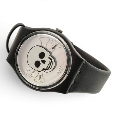 une montre dont le cadran est orné d'un crâne et d'os croisés