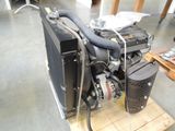a machine that is sitting on a pallet in a room