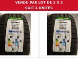 a pair of tires with labels on them and a price tag on them
