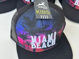 four black and pink hats with the words miami beach on them
