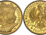 a gold coin with a crown on top of it