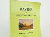 a yellow book with a picture of a tree in the background