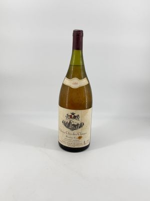 a bottle of wine that is sitting on a table