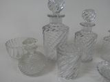 a lot of glass items that are sitting on a table