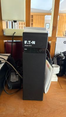 an image of a computer on a desk with a lot of electronics