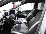 a picture of the inside of a car with the driver ' s seat up