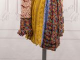 an image of a woman ' s sweater on a mannequin