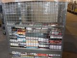 a metal cart with many items on it in a warehouse