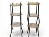 pair of three tiered tables with metal legs and a wooden shelf