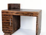 a wooden desk with a drawer on top of it