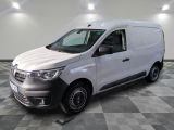 the white van is parked on a checkered floor in a room