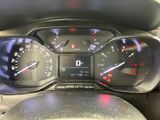 a close up of a car dashboard with a speedometer and gauges