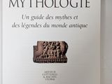 an image of a book with a picture of a statue on it